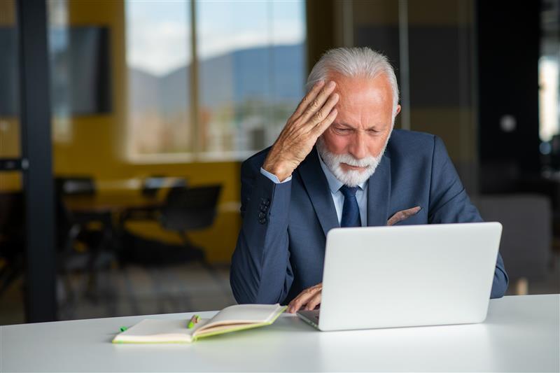 Home - Bogart Wealth Management handsome smiling senior man while sitting at his c 2026 01 07 06 37 58 utc | Bogart Wealth