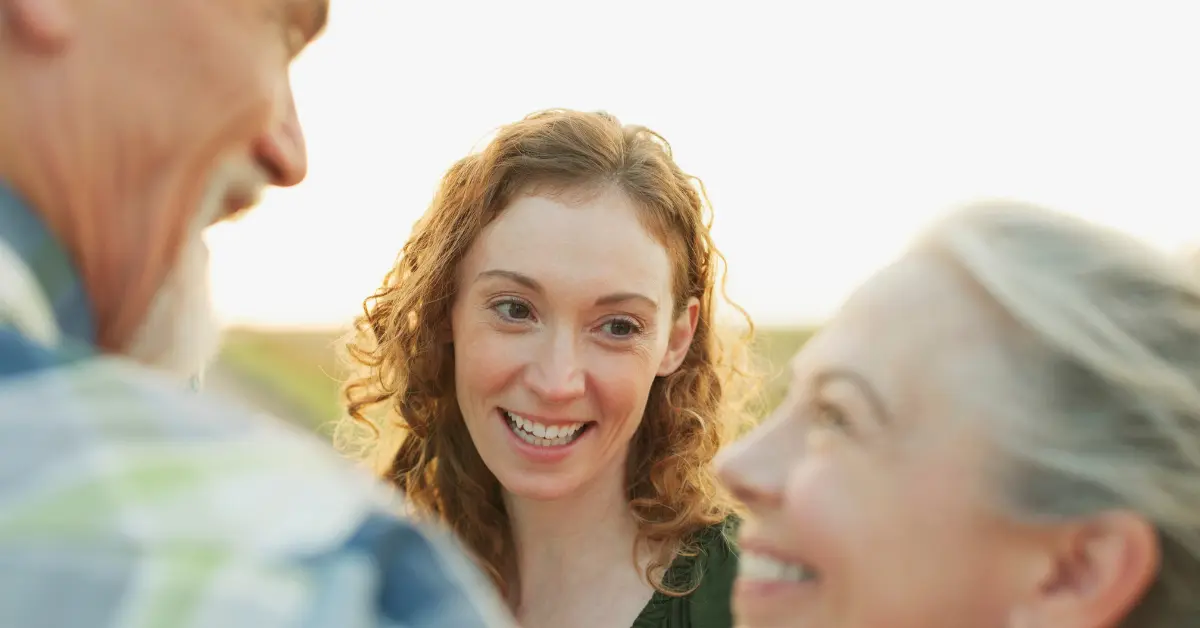 Daughter caring for aging parents by starting the conversation on their upcoming needs