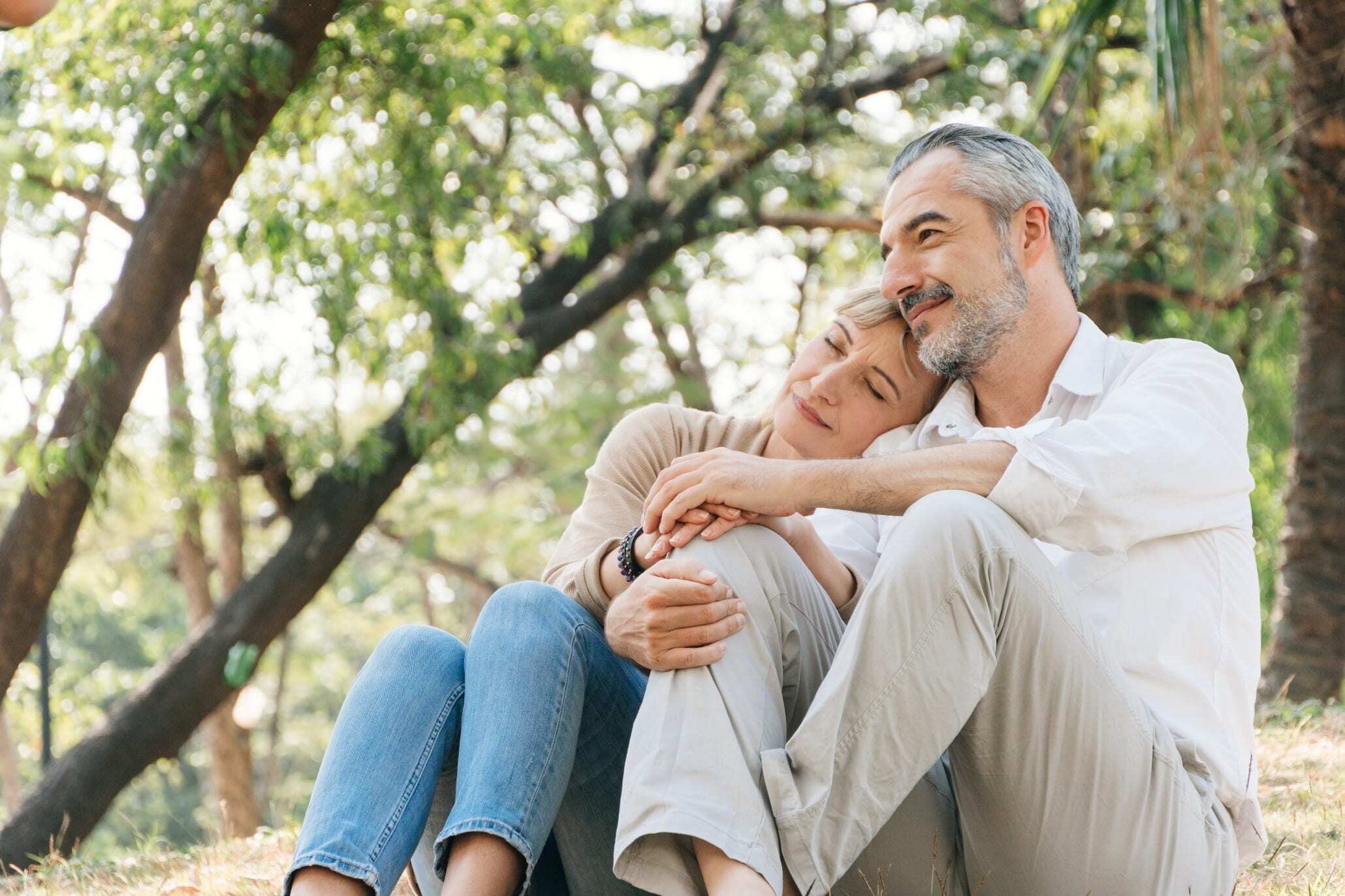 Webinars & Videos - Bogart Wealth Management Senior couple resting in a park after retiring
