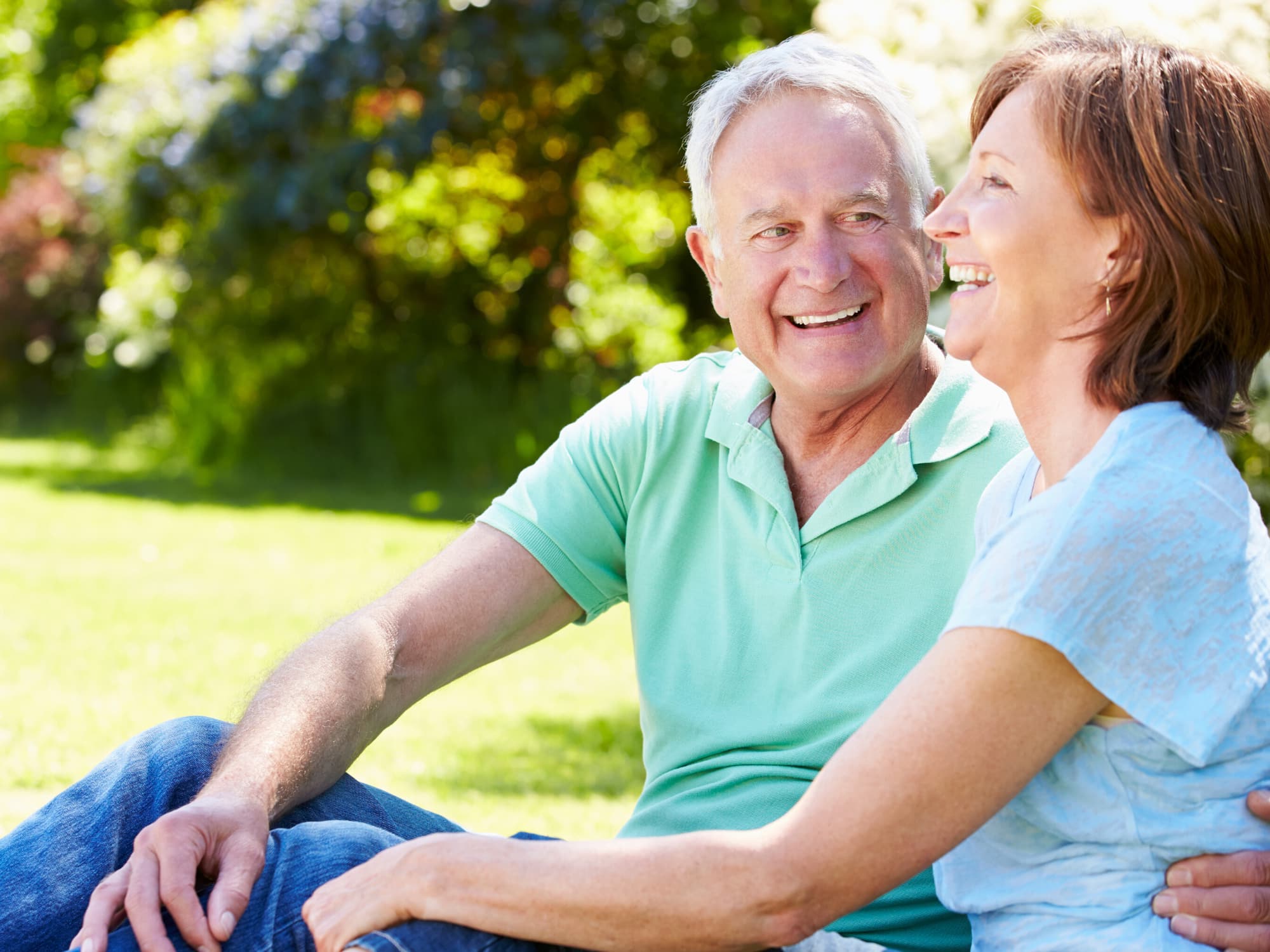Webinars & Videos - Bogart Wealth Management Senior couple sitting outside