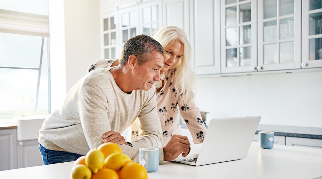 HSAs and Retirement Planning - Bogart Wealth Management couple taking a look at their 401k plan